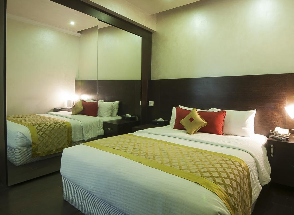 Jukaso Inn Pragati Maidan Nova Deli Quarto foto